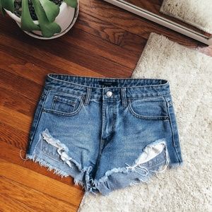 Mid rise cut off denim shorts